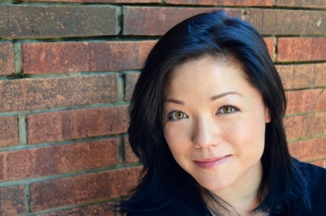 Look at that, a color photo of a Eurasian Dual Citizen! Defacto - a woman of color